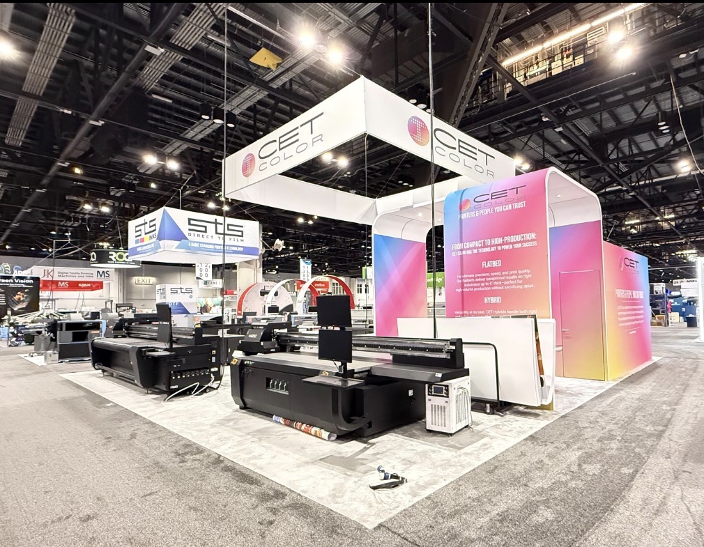 Custom tradeshow booth design, fabrication, and installation for CET by FX Design Group, featuring integrated digital signage and modern architectural elements.
